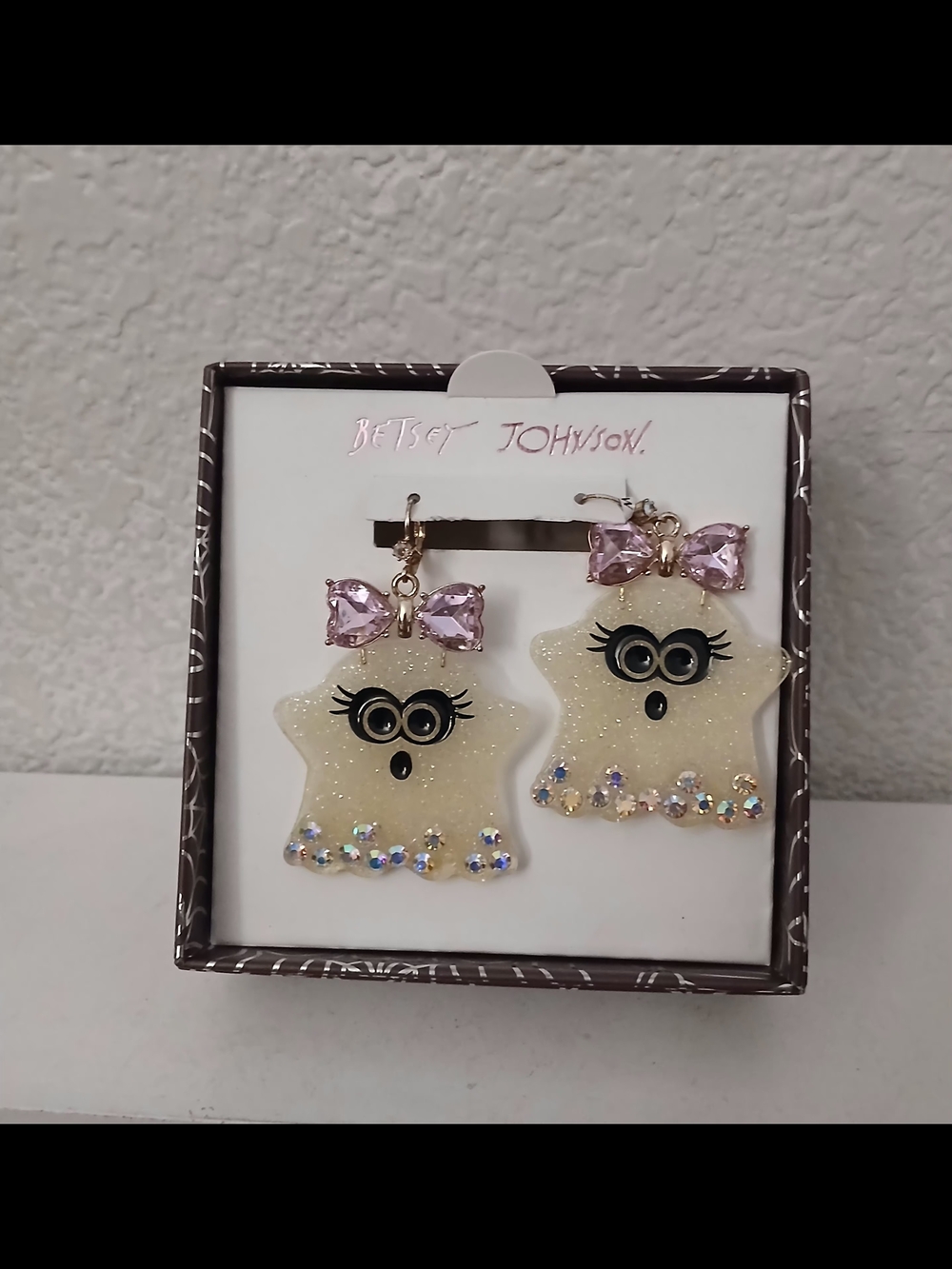Betsey Johnson Cream Glitter Ghost Earrings with Pink Bow Accents